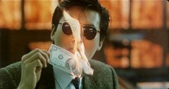 Mark (Chow Yun Fat) brlant un billet, image rest culte